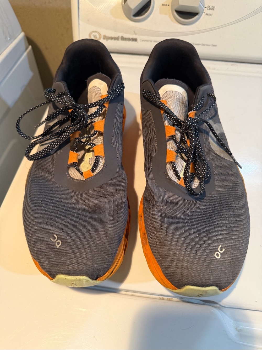 On Running Men’s  Gray Sneakers with Orange Accents